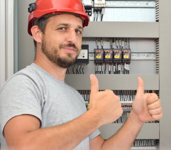 technician showing thumbs up